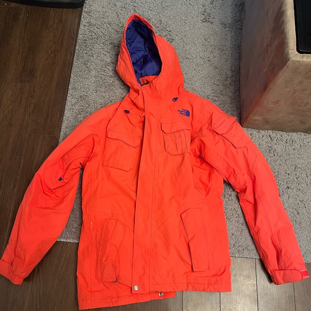 Pink women’s Northface snowboard coat